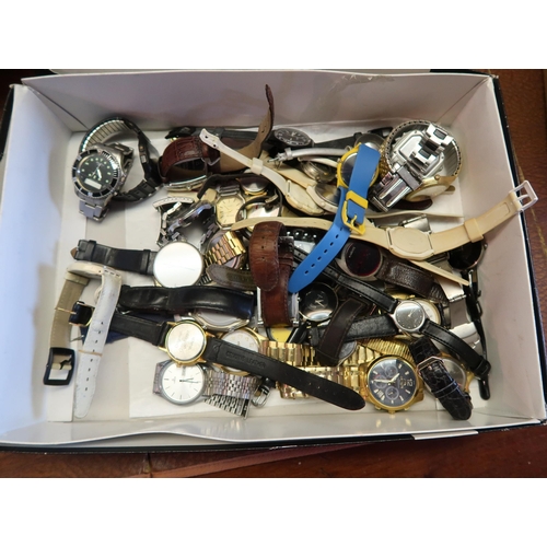 831 - Box containing a quantity of various quartz wristwatches, including a Seiko automatic and a small ch... 