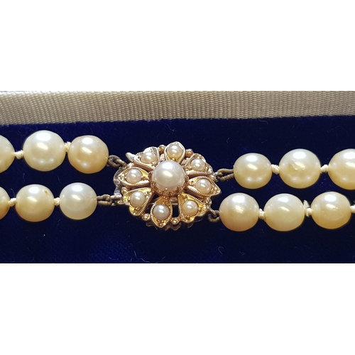 870 - Double row graduated cultured pearl necklace with a 9ct gold clasp