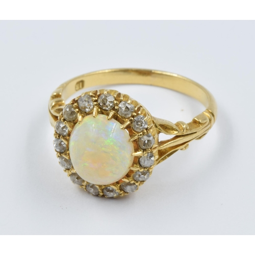 924 - Early 20th Century 18ct gold opal and diamond cluster ring