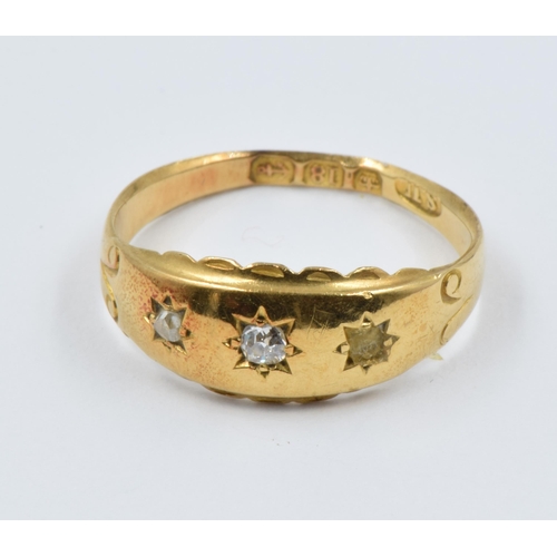 928 - Small 19th Century 18ct gold gipsy ring set with two diamonds (one diamond missing)