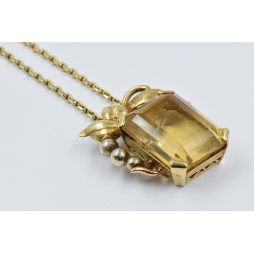 952 - Austrian 14ct gold citrine set pendant on chain, together with a pair of matching ear clips