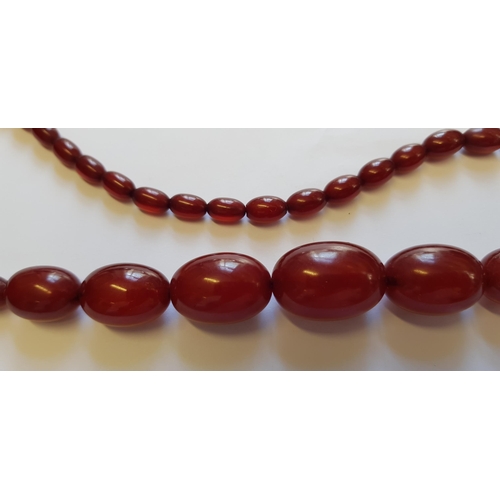 998 - Cherry amber graduated bead necklace (later re-strung)