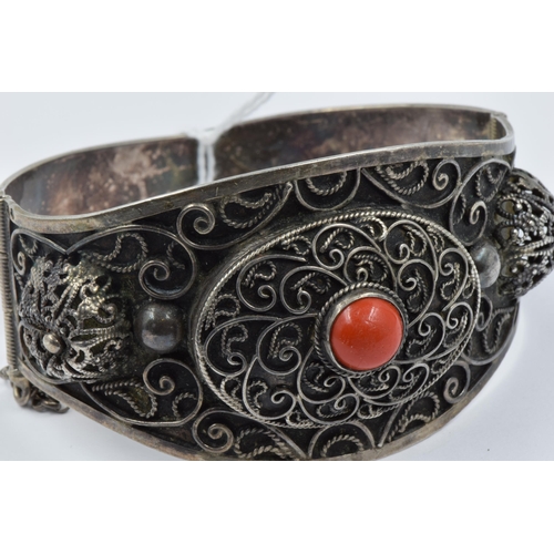 999 - Indian white metal bangle mounted with coral