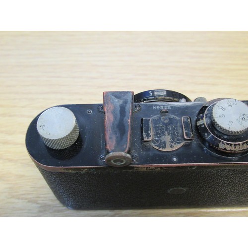 202 - Early Leica I 35mm camera, Serial No. 225, with a Leitz Anastigmat 50mm lens, with original brown le... 