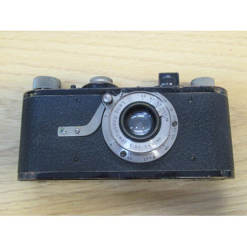 202 - Early Leica I 35mm camera, Serial No. 225, with a Leitz Anastigmat 50mm lens, with original brown le... 