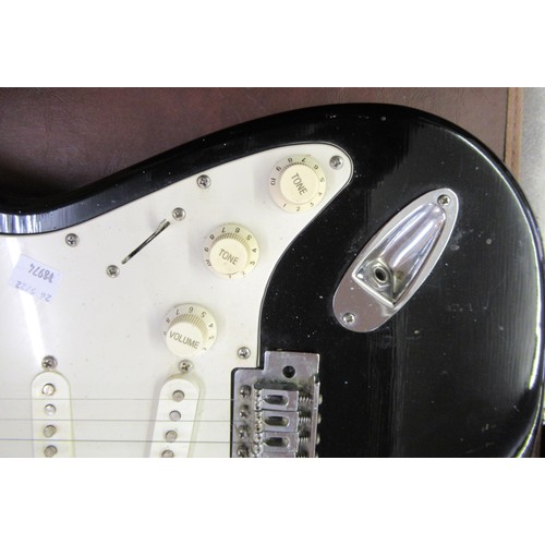 315 - 1970's / 80's Stratocaster type six string electric guitar with black body (bearing decals)