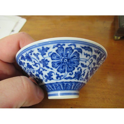 516 - Small Chinese blue and white conical floral decorated dish with character mark to base