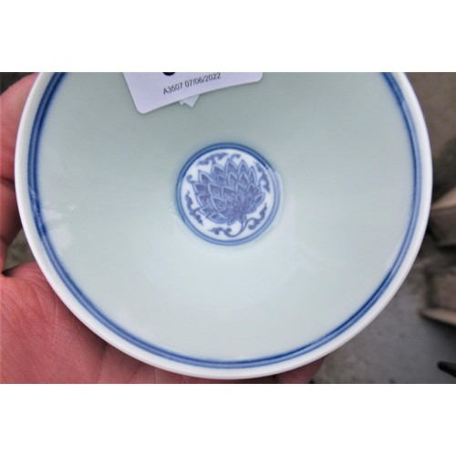 516 - Small Chinese blue and white conical floral decorated dish with character mark to base