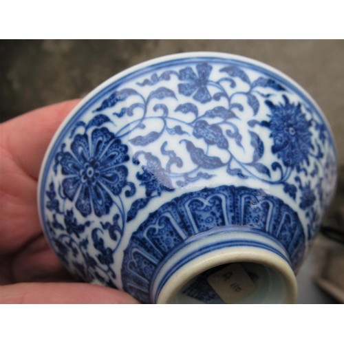 516 - Small Chinese blue and white conical floral decorated dish with character mark to base