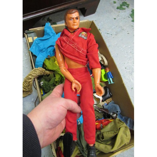 261 - Box containing a quantity of various Action Man clothing, motorbike and one figure in Six Million Do... 