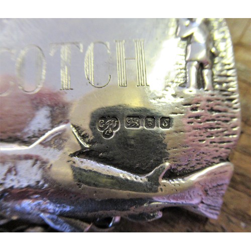 802 - Heavy London silver Scotch Whisky decanter label decorated with a fisherman catching a fish