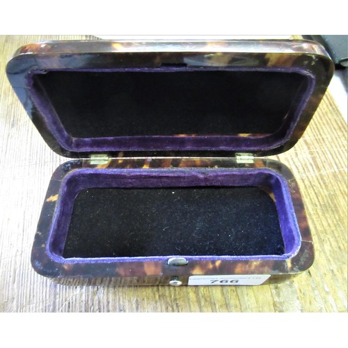 766 - Tortoiseshell and silver pique work rectangular trinket box with hinged cover, 5.25ins wide