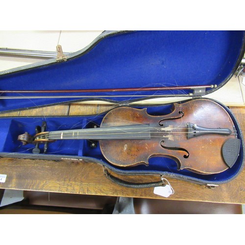 72 - Late 19th / early 20th Century violin with 14in 
two piece back bearing label, with single bow in fi... 