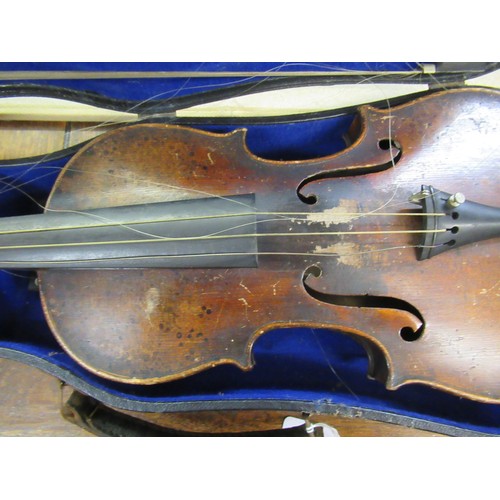 72 - Late 19th / early 20th Century violin with 14in 
two piece back bearing label, with single bow in fi... 