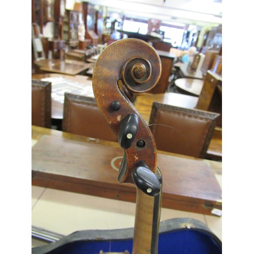 72 - Late 19th / early 20th Century violin with 14in 
two piece back bearing label, with single bow in fi... 