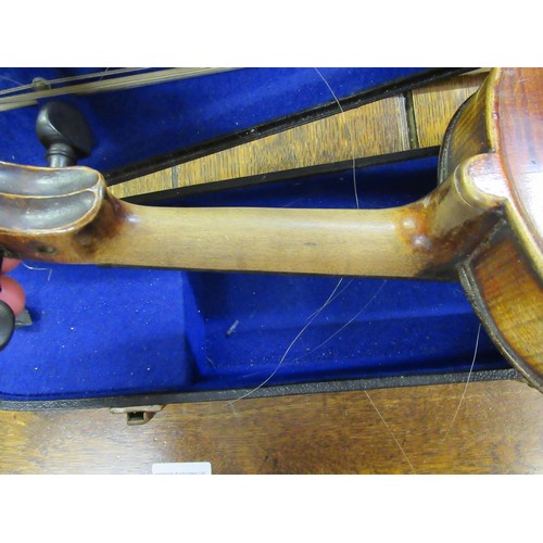 72 - Late 19th / early 20th Century violin with 14in 
two piece back bearing label, with single bow in fi... 