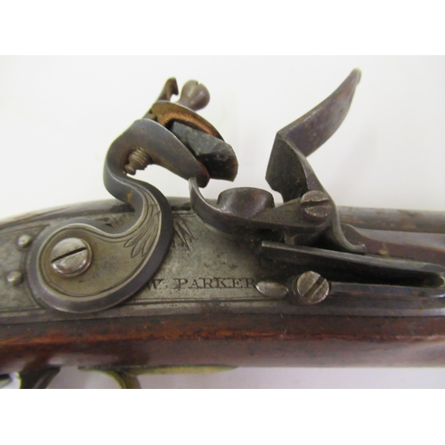103 - Late 18th / early 19th Century flintlock pistol by W. Parker, the barrel inscribed ' Maker to His Ma... 