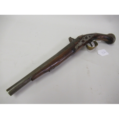 106 - 18th Century Continental flintlock pistol with a tapering steel barrel, engraved steel lock plate, b... 