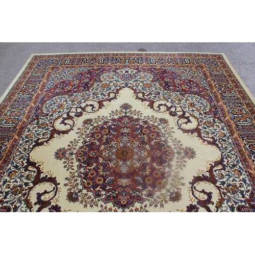 11 - Machine woven Persian design carpet on beige ground, 144ins x 108ins