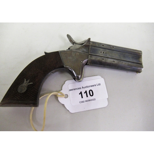 110 - Woodward's No. 129 patent over and under turnover pistol, with round barrels and knurled walnut grip... 