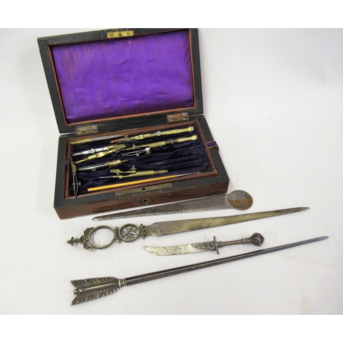 126 - Small rosewood cased set of brass and boxwood drawing instruments, together with a silver plated pap... 