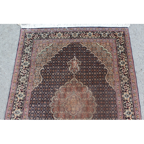 13 - Small modern Indo Persian rug with lobed medallion and all-over Herati design on a midnight blue gro... 