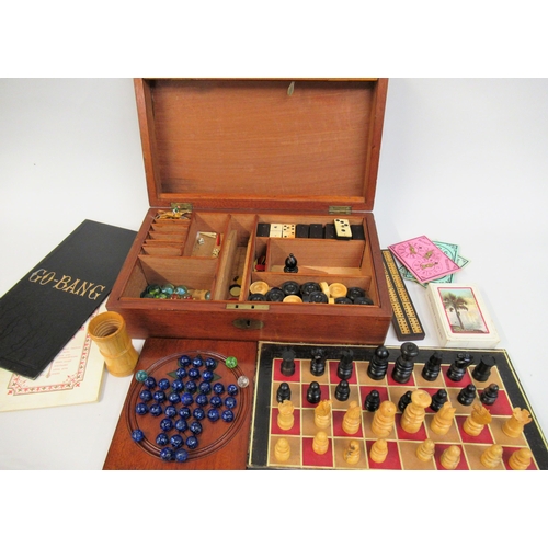 1822 - Late 19th / early 20th Century mahogany games compendium, the rectangular box with a hinged cover en... 