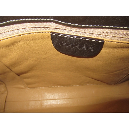 20 - Tanner Krolle, large tan leather shoulder bag with black trim and hook and loop fastening, together ... 