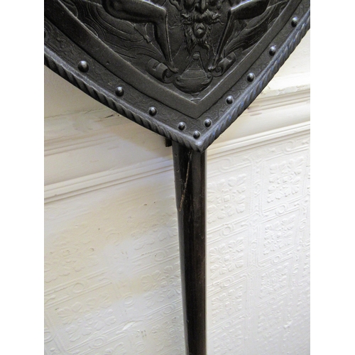 224 - 19th Century brown patinated cast iron sword and shield wall plaque, with attached halberd