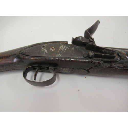 225 - Antique flintlock blunderbuss (in poor condition), together with a mother of pearl inlaid flintlock ... 