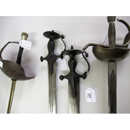 227 - Two 19th Century Indian tulwar swords, together with a replica sword and a fencing foil