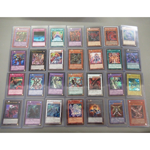 347 - Quantity of loose Yu-Gi-Oh! trading cards, including Blue Eyes, White Dragon, Dark Magician and Blac... 