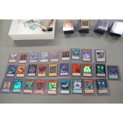 347 - Quantity of loose Yu-Gi-Oh! trading cards, including Blue Eyes, White Dragon, Dark Magician and Blac... 