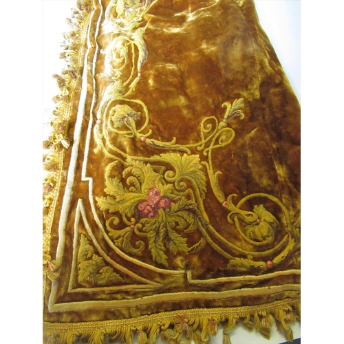 39 - Pair of French gold velvet curtains with pelmet, decorated with cherubs