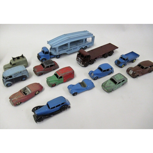 63 - Group of eleven various early Dinky playworn diecast metal model vehicles, together with a Dinky Bed... 