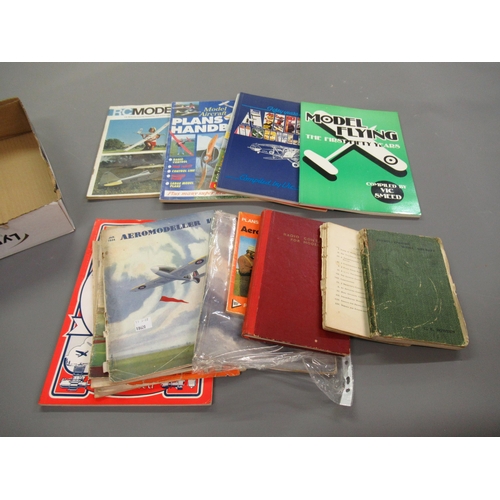 64 - Box containing a small quantity of various aeroplane modelling catalogues and books