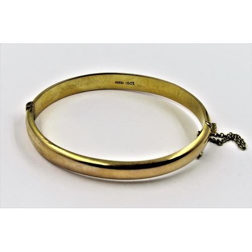 851 - 15ct Gold bangle of plain oval design, 10g