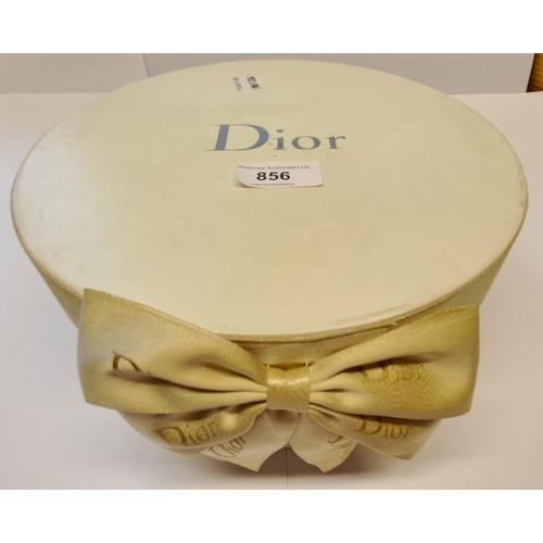 856 - Circular Dior box containing various costume jewellery