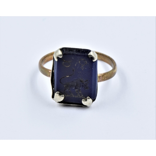 903 - Antique gilt and white metal blue stone intaglio ring