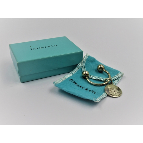 911 - Tiffany & Co. silver keyring, with original packaging