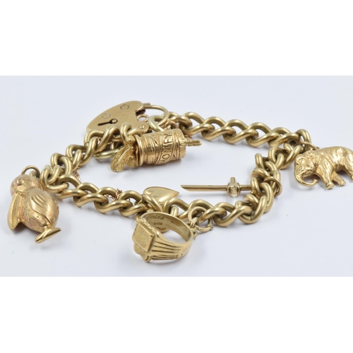 959 - 9ct Gold charm bracelet with padlock clasp, 32g