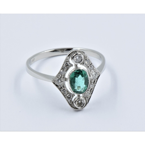 963 - Platinum Art Deco style ring set with central oval emerald surrounded by diamonds, size N.5