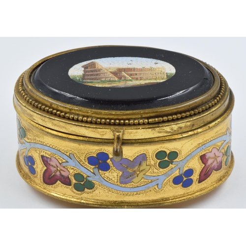 966 - Late 19th / early 20th Century gilt brass and enamel decorated oval trinket box, the hinged cover in... 