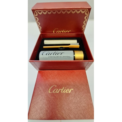 984 - Cartier jewellery cleaning kit, Swarovski ring and a small quantity of other miscellaneous costume j... 