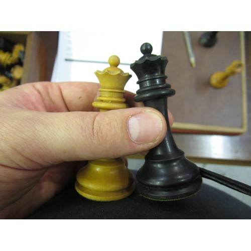 59 - Staunton pattern ebony and boxwood weighted chess set with stamp of a crown on two of the castles, t... 