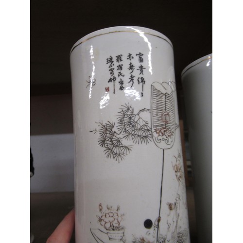 483 - Pair of Chinese Republic period cylindrical vases decorated in monochrome with figures in a landscap... 