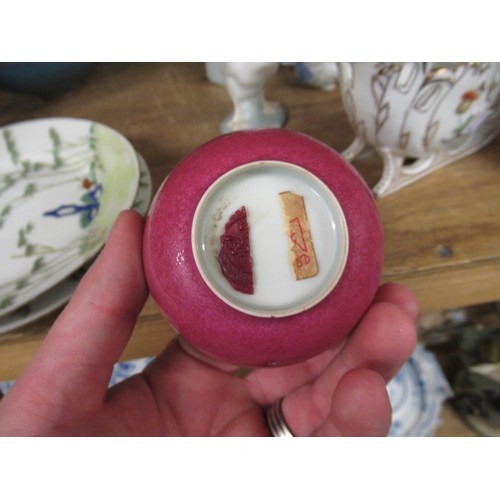 521 - Reproduction Chinese tea bowl with cerise mottled glaze, with wax part seal to base, 3.5ins diameter