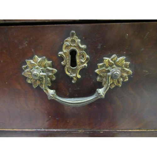 1817 - George III mahogany dressing chest, the moulded top above pull-out slide, with two side drawers abov... 