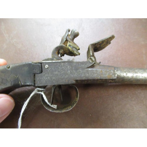 102 - 18th Century flintlock double barrelled side by side pistol with silver wire inlaid grip, 9.5ins lon... 