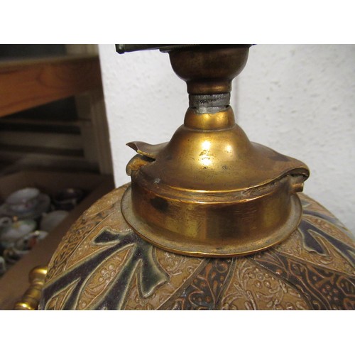 511 - Doulton Lambeth stoneware and gilt brass mounted oil lamp base, the incised stylised floral decorati... 